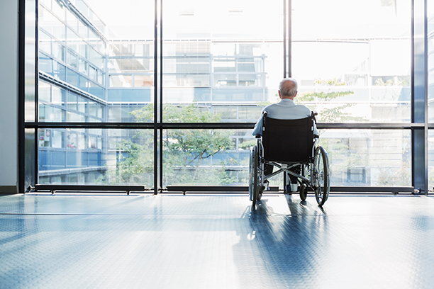 man-in-wheelchair-at-window.jpg